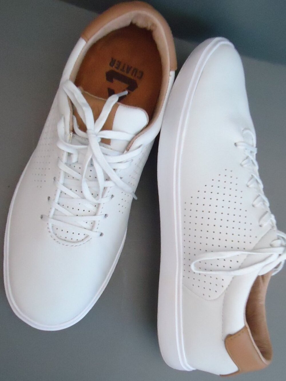 SIZE 9.5. Travis Mathew Cuater "Phenom" leather sneakers.